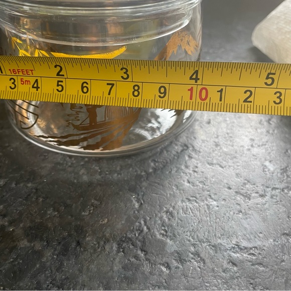 Round clear glass trinket jar with a lid, adorned with gold Asian symbols - Picture 9 of 9